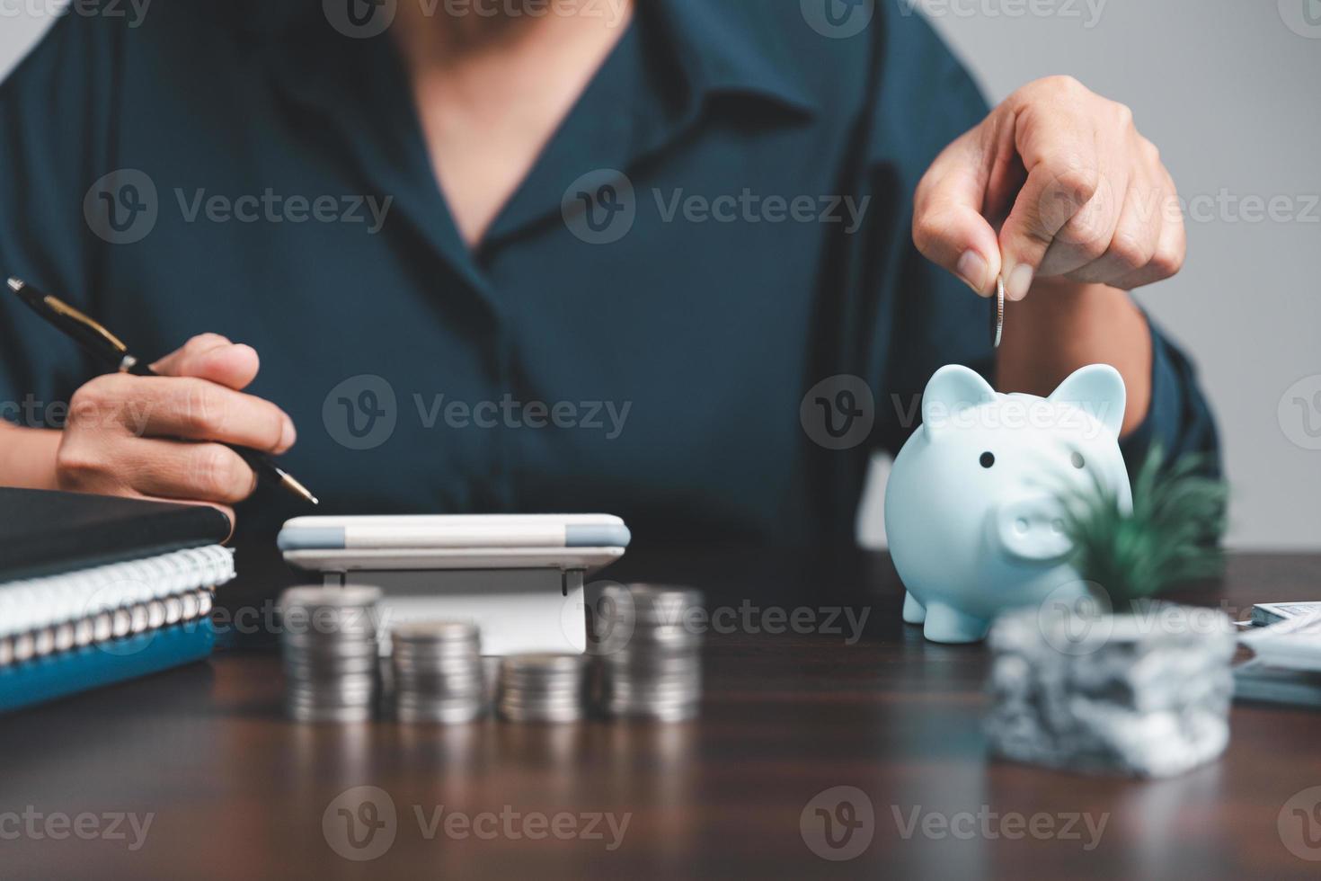 Saving investment banking finance concept. Stack of coins with piggy bank on the table. Growth of loan and investment business idea. Asset Management, Funds, Liabilities, Deposits, Income, Successful. photo