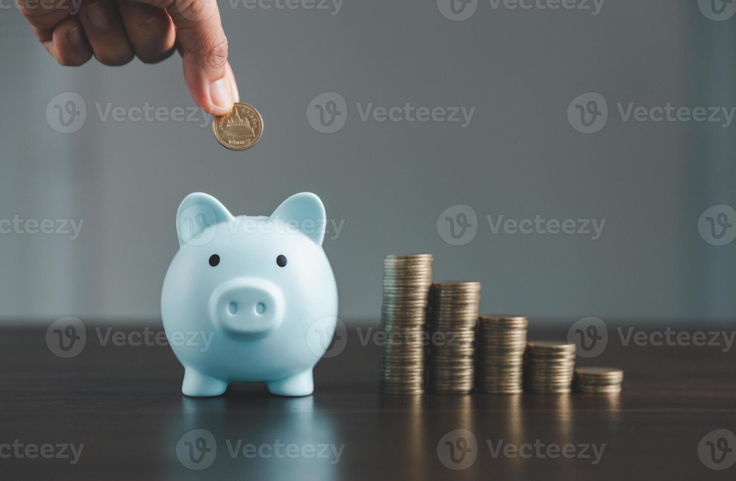 Saving investment banking finance concept. Stack of coins with piggy bank on the table. Growth of loan and investment business idea. Asset Management, Funds, Liabilities, Deposits, Income, Successful. photo