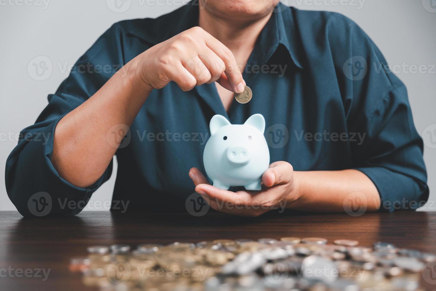 Saving investment banking finance concept. Stack of coins with piggy bank on the table. Growth of loan and investment business idea. Asset Management, Funds, Liabilities, Deposits, Income, Successful. photo