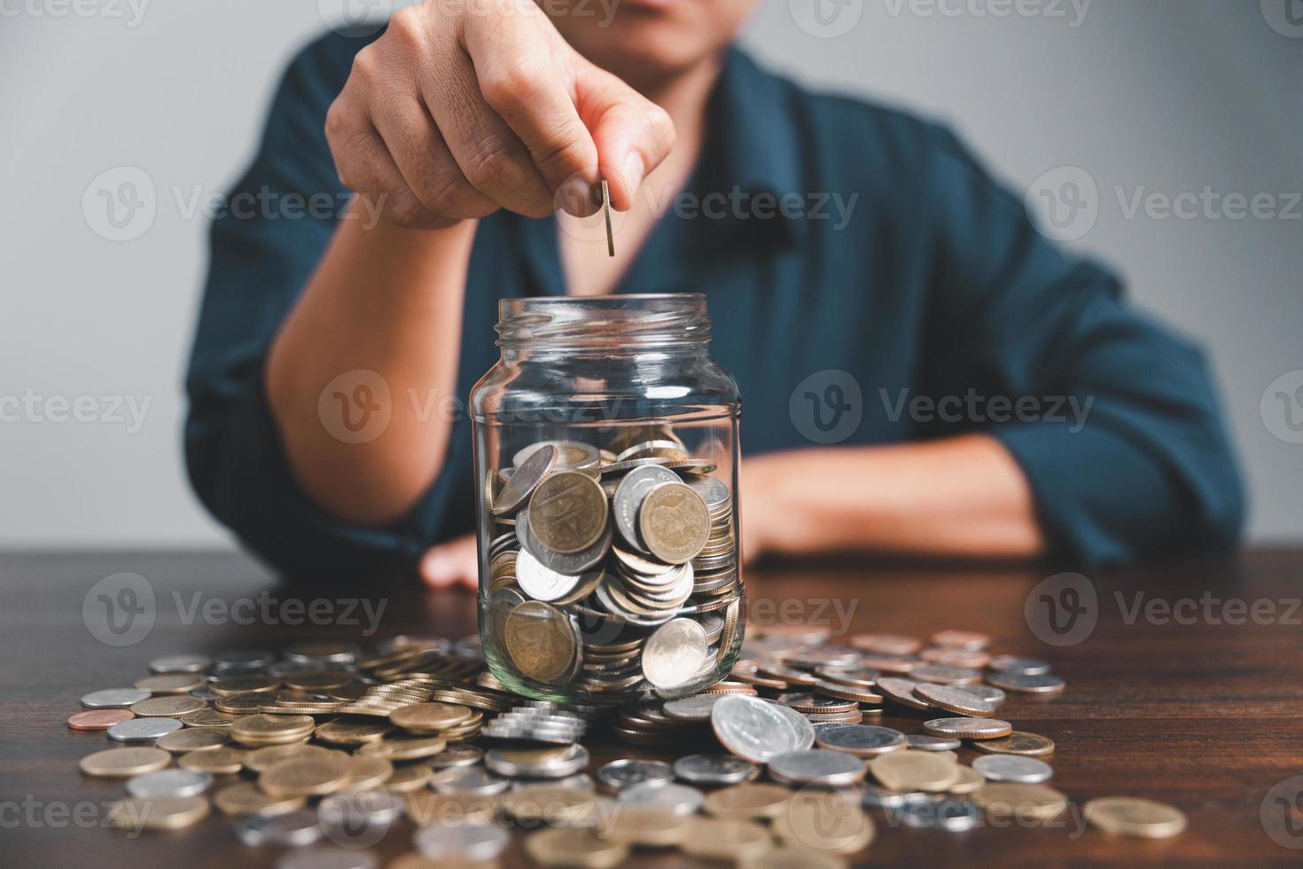 Saving investment banking finance concept. Stack of coins with piggy bank on the table. Growth of loan and investment business idea. Asset Management, Funds, Liabilities, Deposits, Income, Successful. photo