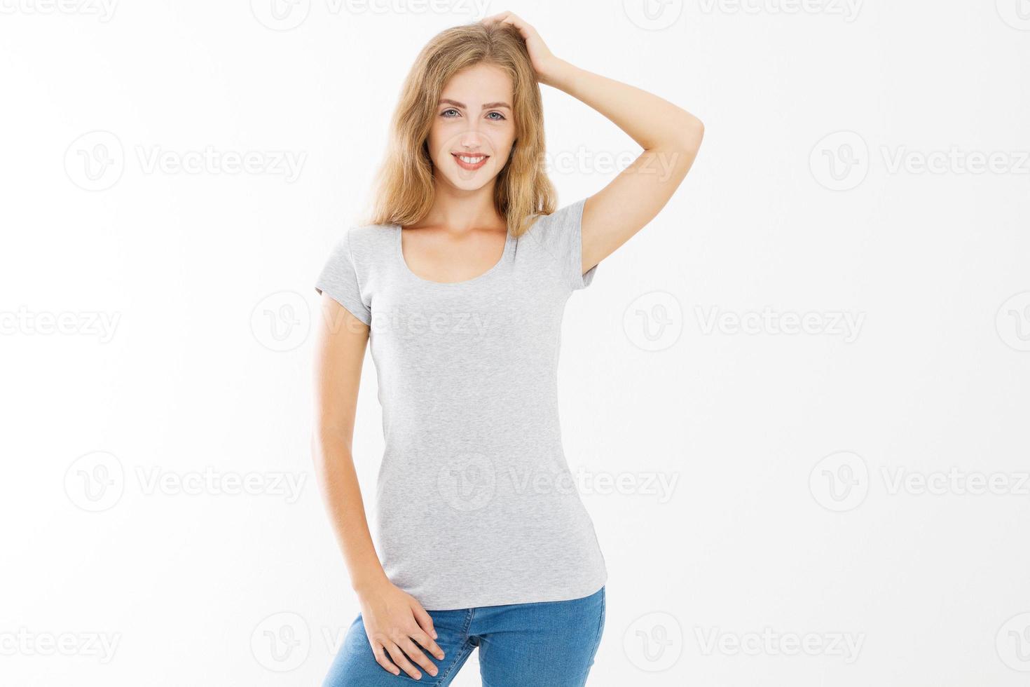 Young blonde woman with fit slim body in blank template t shirt and jeans isolated on white background. Skin and hair care. Copy space and mock up photo