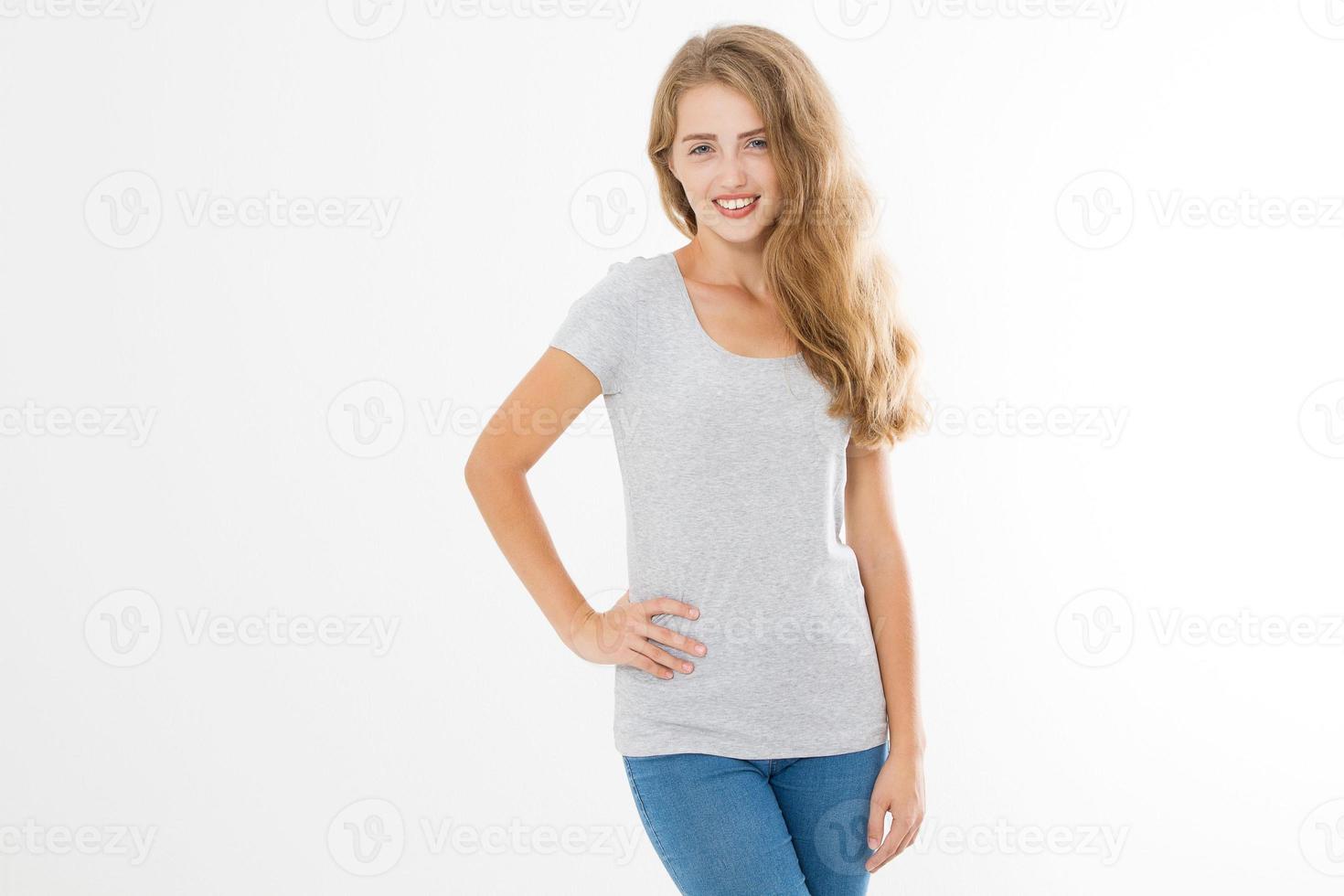 Young blonde woman with fit slim body in blank template t shirt and jeans isolated on white background. Skin and hair care. Copy space and mock up photo