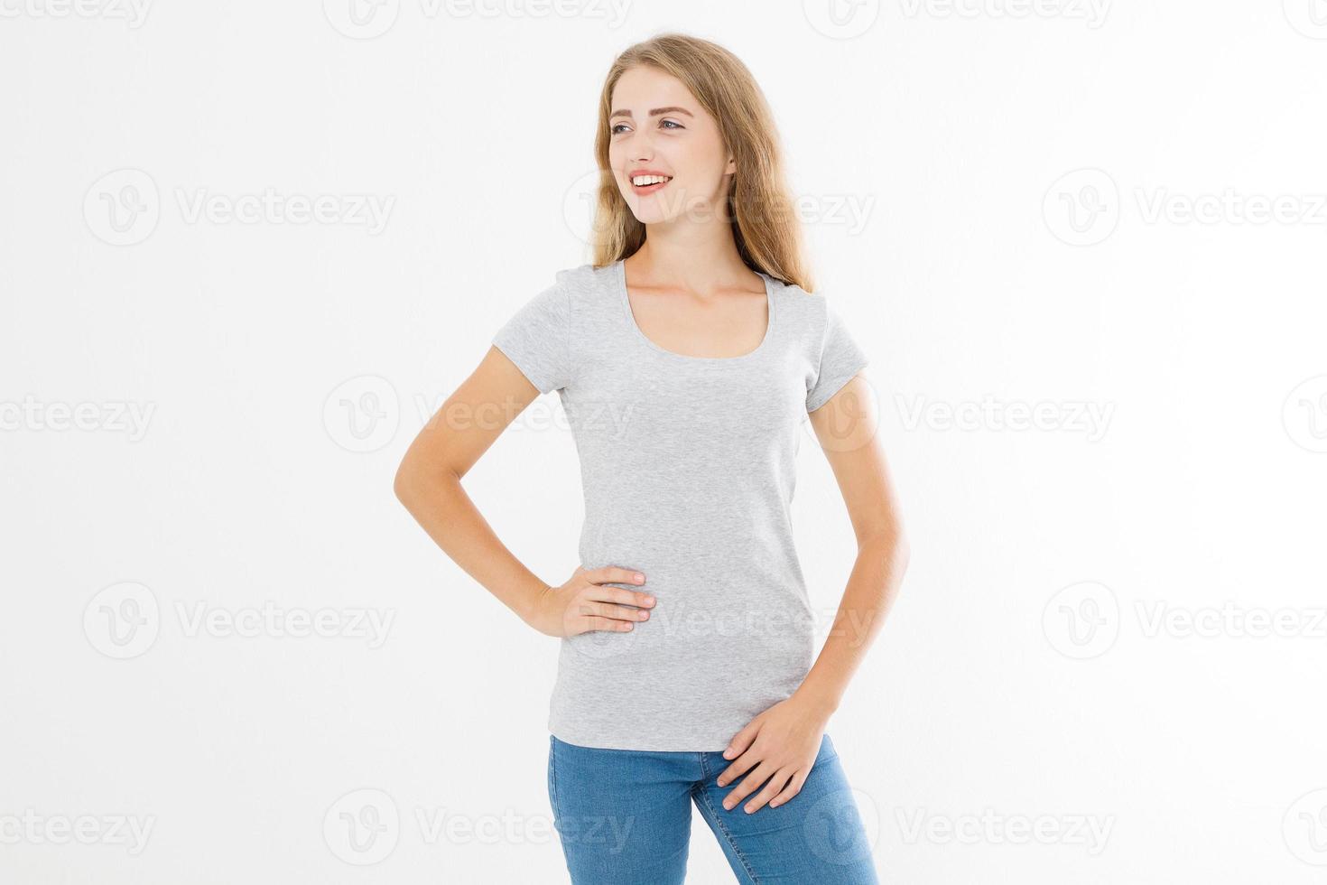 Young blonde woman with fit slim body in blank template t shirt and jeans isolated on white background. Skin and hair care. Copy space and mock up photo
