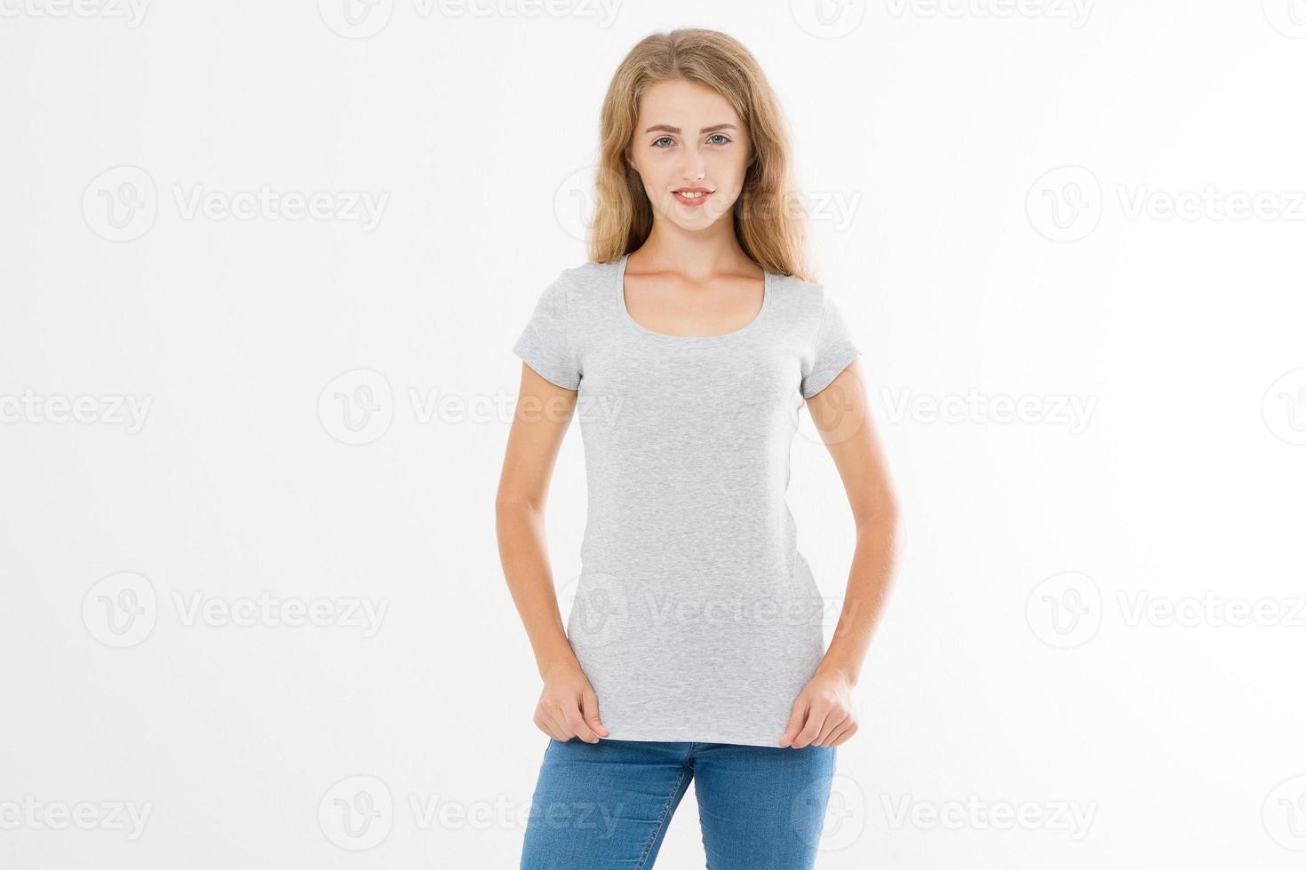 Young blonde woman with fit slim body in blank template t shirt and jeans isolated on white background. Skin and hair care. Copy space and mock up photo