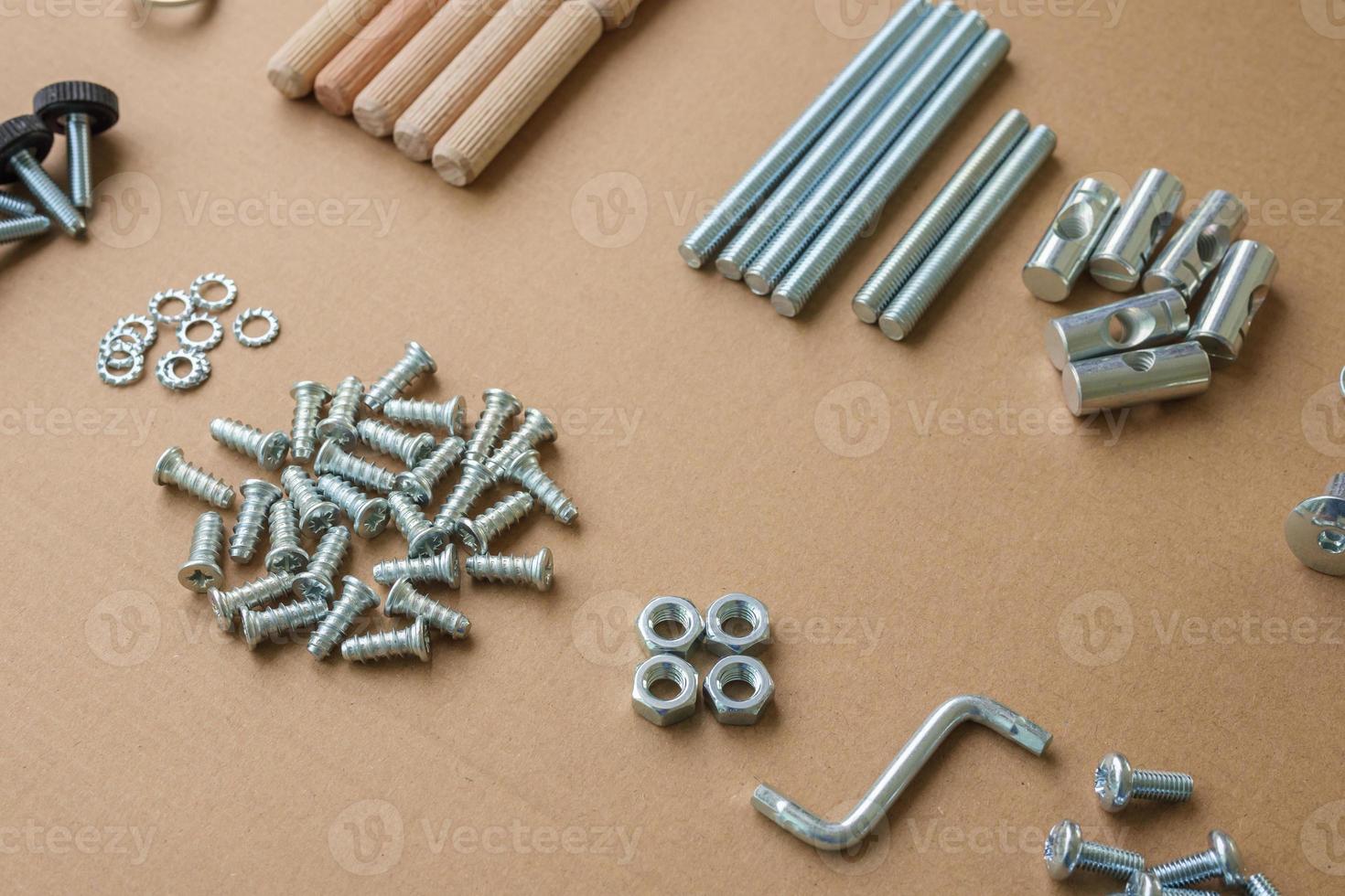 Assembly furniture tool kit with screw dowel wrench and bolt photo