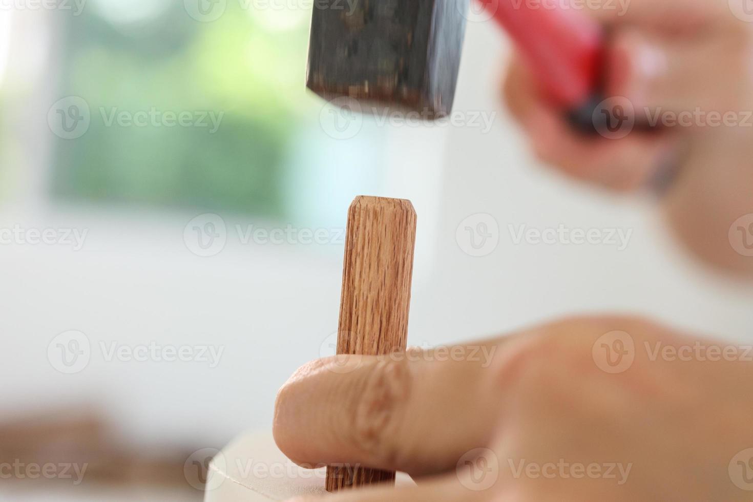 Man assembling furniture at home photo