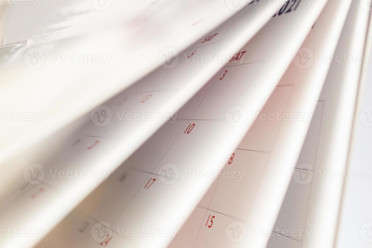 Abstract blur calendar page flipping sheet close up background business schedule planning appointment meeting concept photo