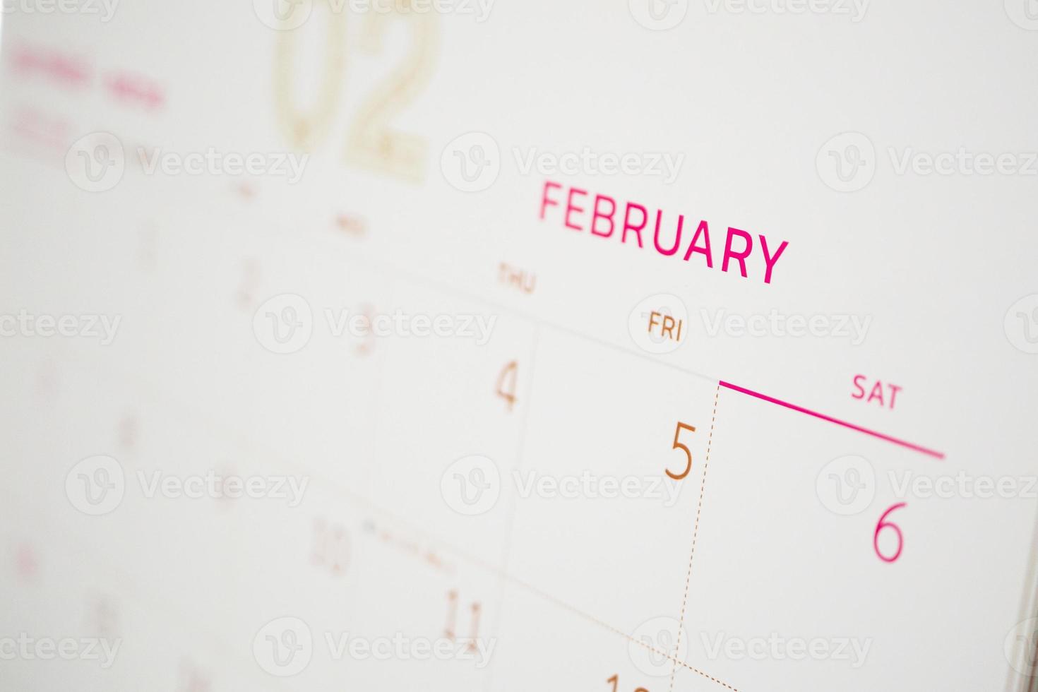 February calendar page with months and dates business planning appointment meeting concept photo