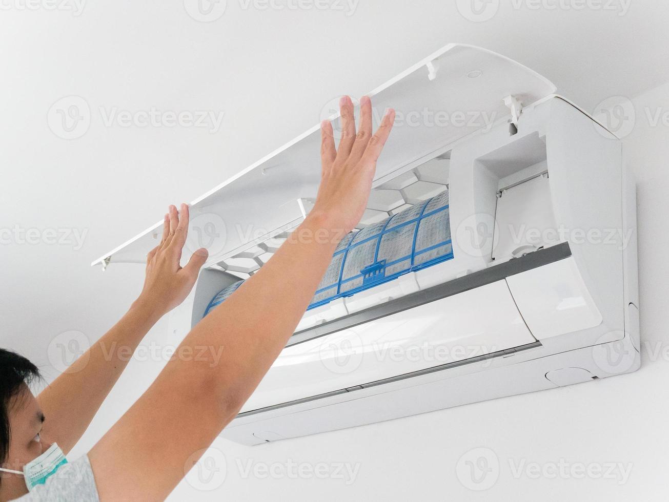 man hand hold air conditioner filter cleaning concept photo