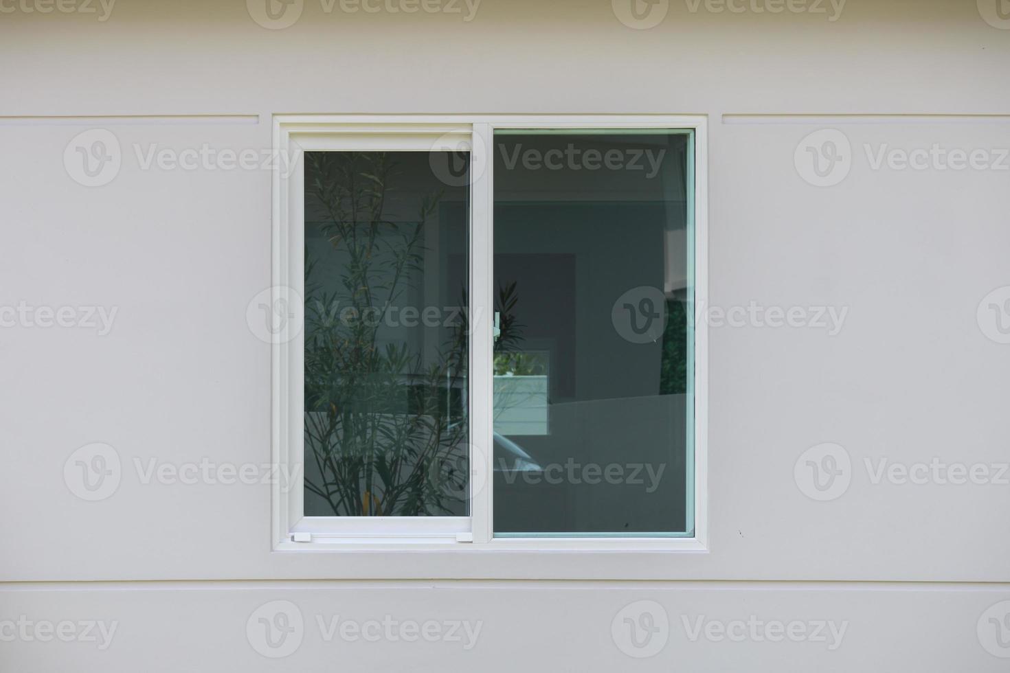 Modern window frame outside the house photo
