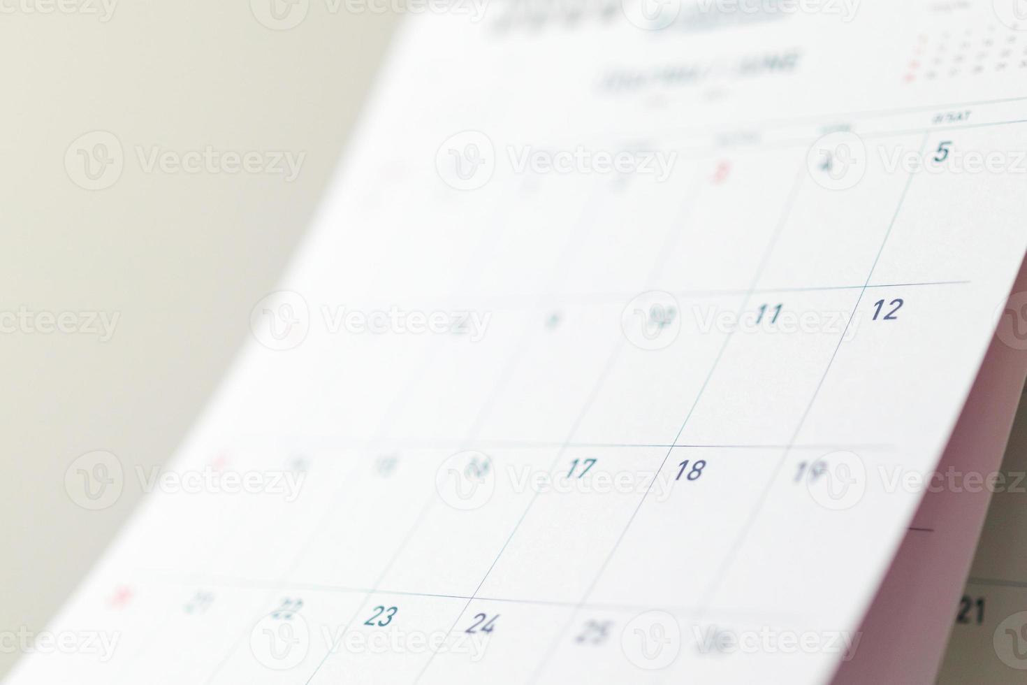 Abstract blur calendar page flipping sheet close up background business schedule planning appointment meeting concept photo