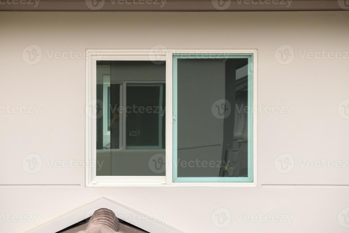Modern window frame outside the house photo