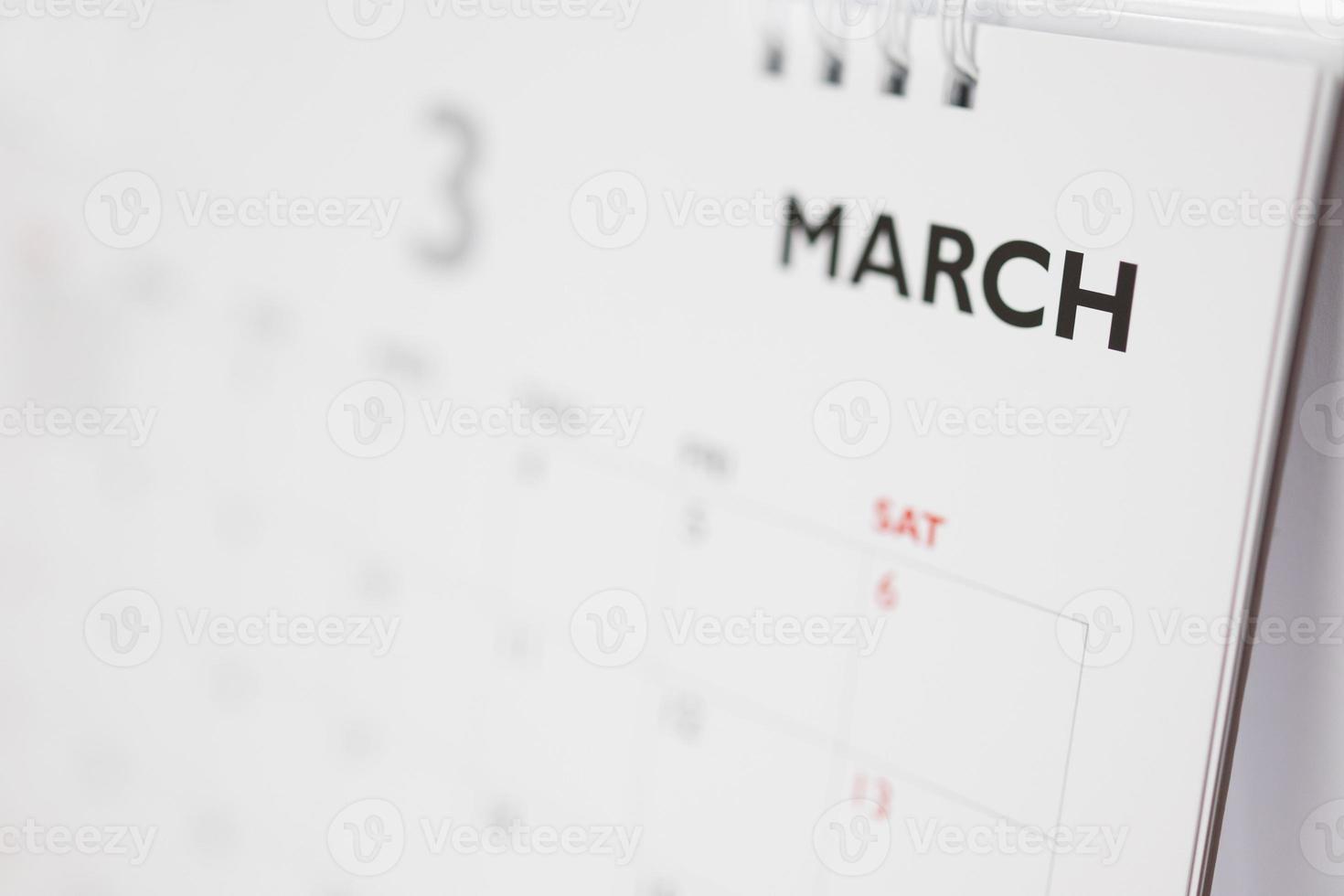 March calendar page with months and dates business planning appointment meeting concept photo