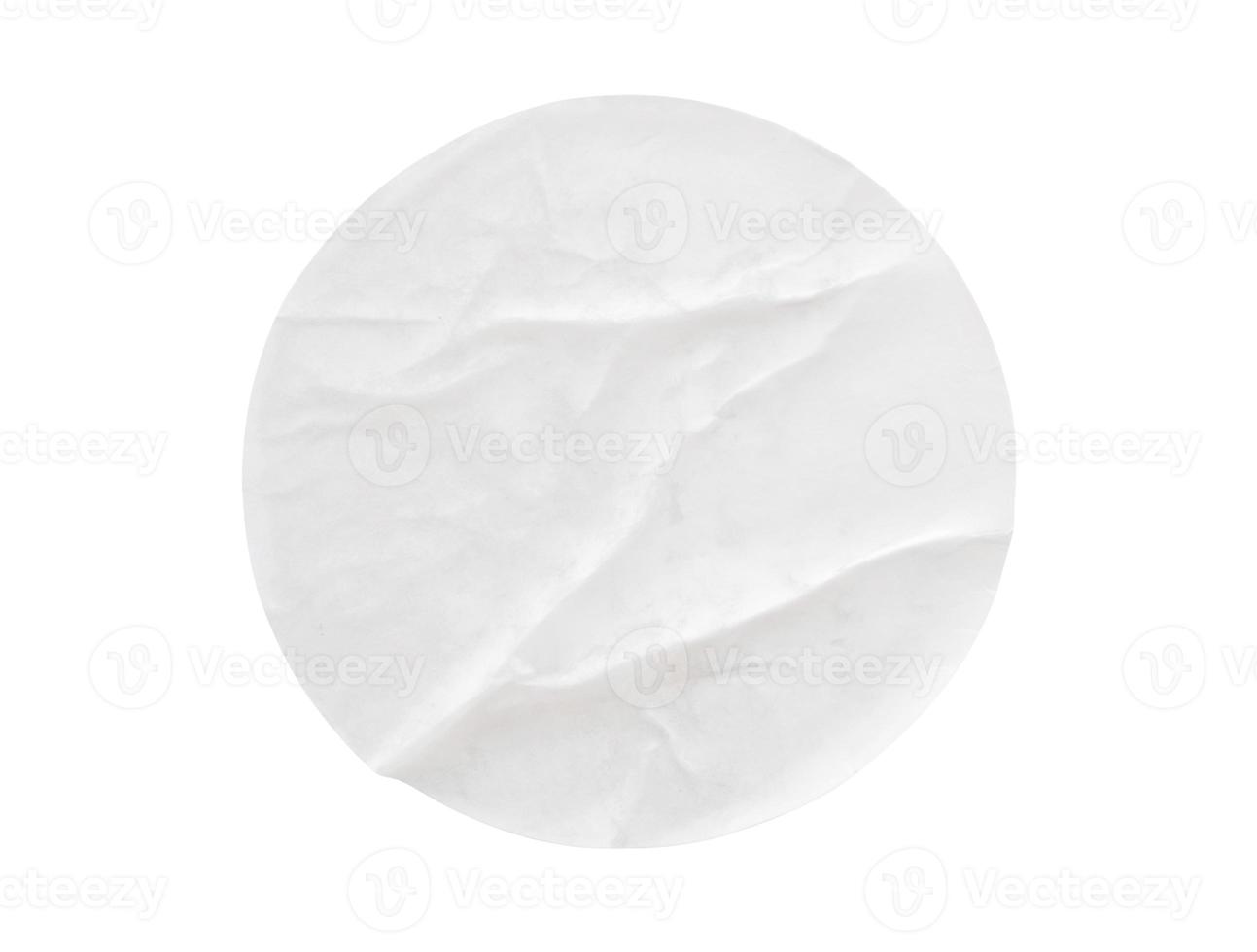 Blank white round paper sticker label isolated on white background photo