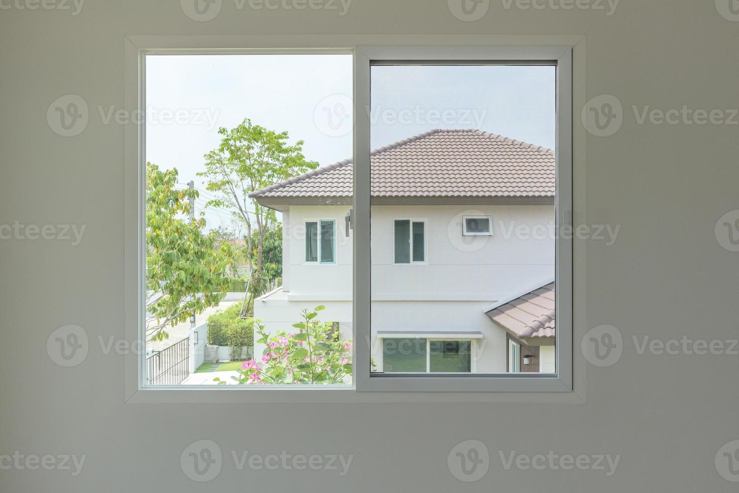 Glass window frame house interior on white wall photo