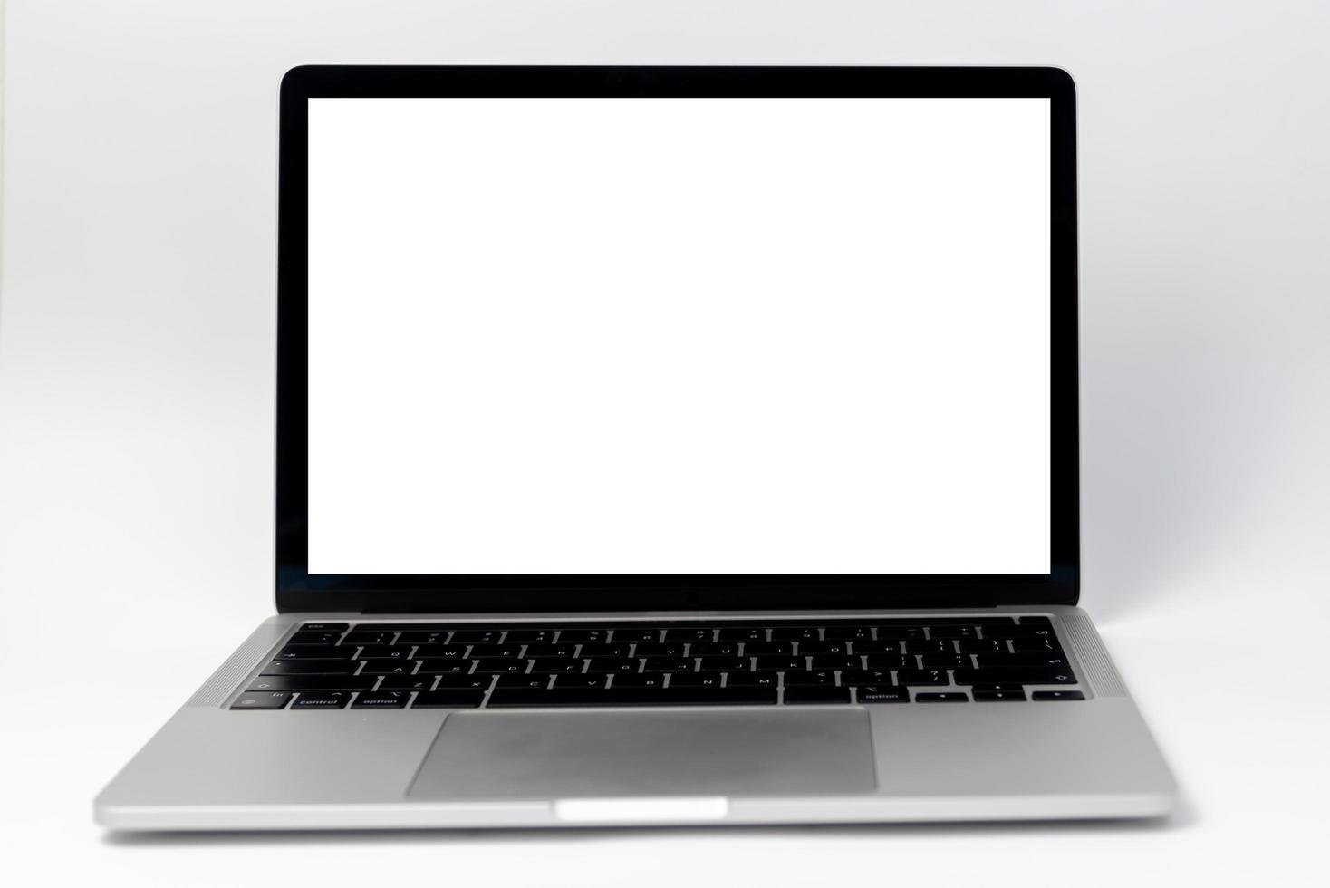 laptop computer frame with isolated white background blank screen. template presentation and advertisement. photo