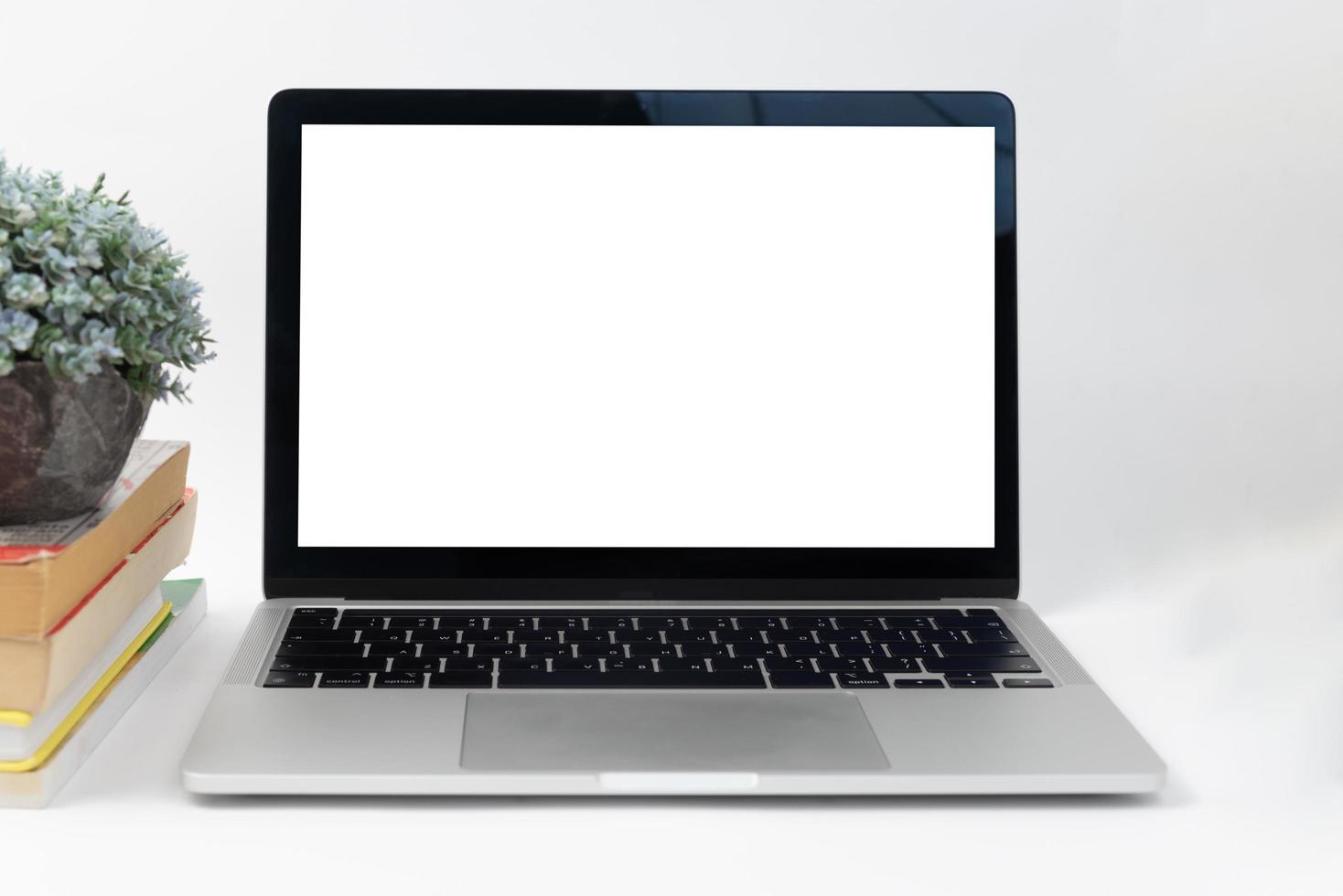 Workspace desk and laptop. copy space and blank screen. Business image, Blank screen laptop and supplies. photo