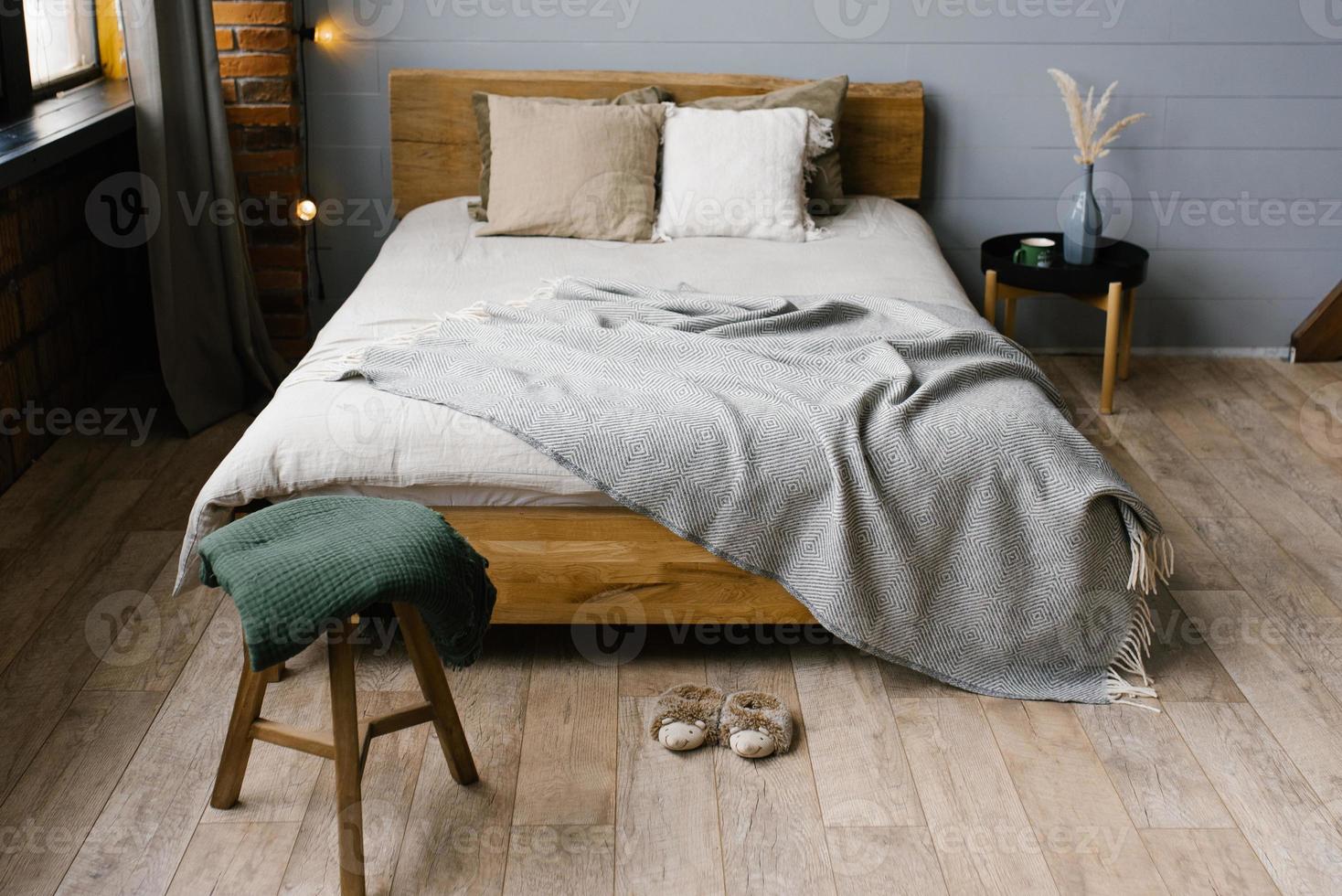 Master bedroom for a stylish family. A modern room with a trendy grey interior in a Scandinavian style photo