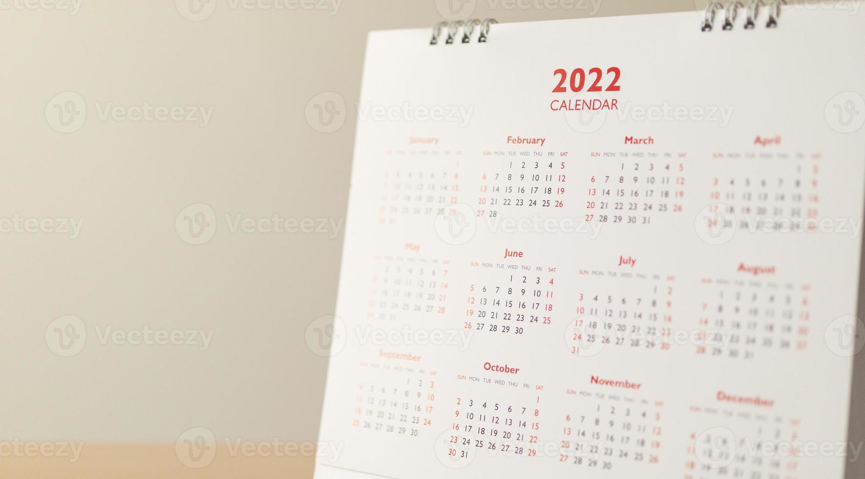 cierre las fechas de la página del calendario 2022 y el fondo del mes concepto de reunión de cita de planificación empresarial foto
