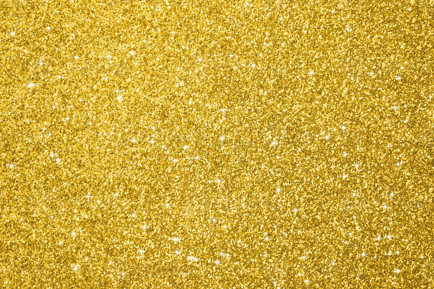 Abstract gold glitter sparkle background photo