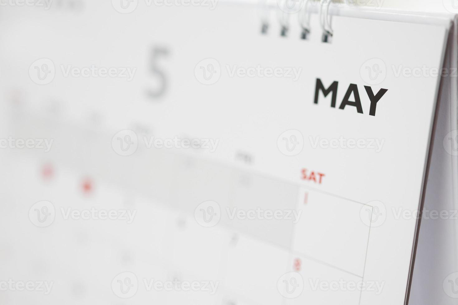 May calendar page with months and dates business planning appointment meeting concept photo