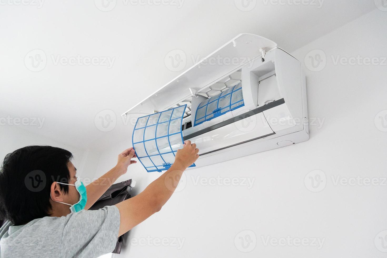 man hand hold air conditioner filter cleaning concept photo