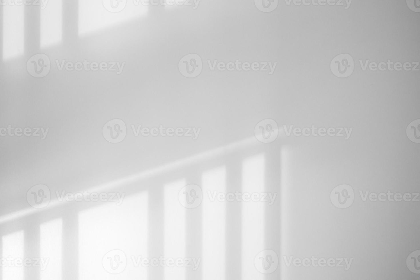 Window shadow drop on white wall background photo