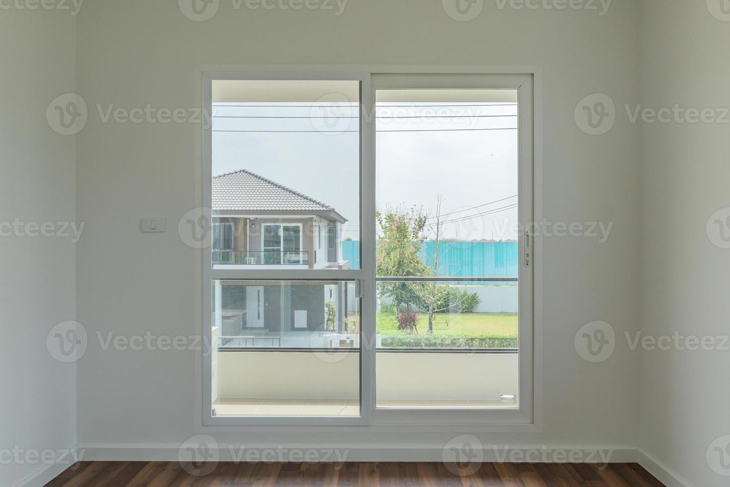 Empty room with glass window frame house interior on concrete wall photo