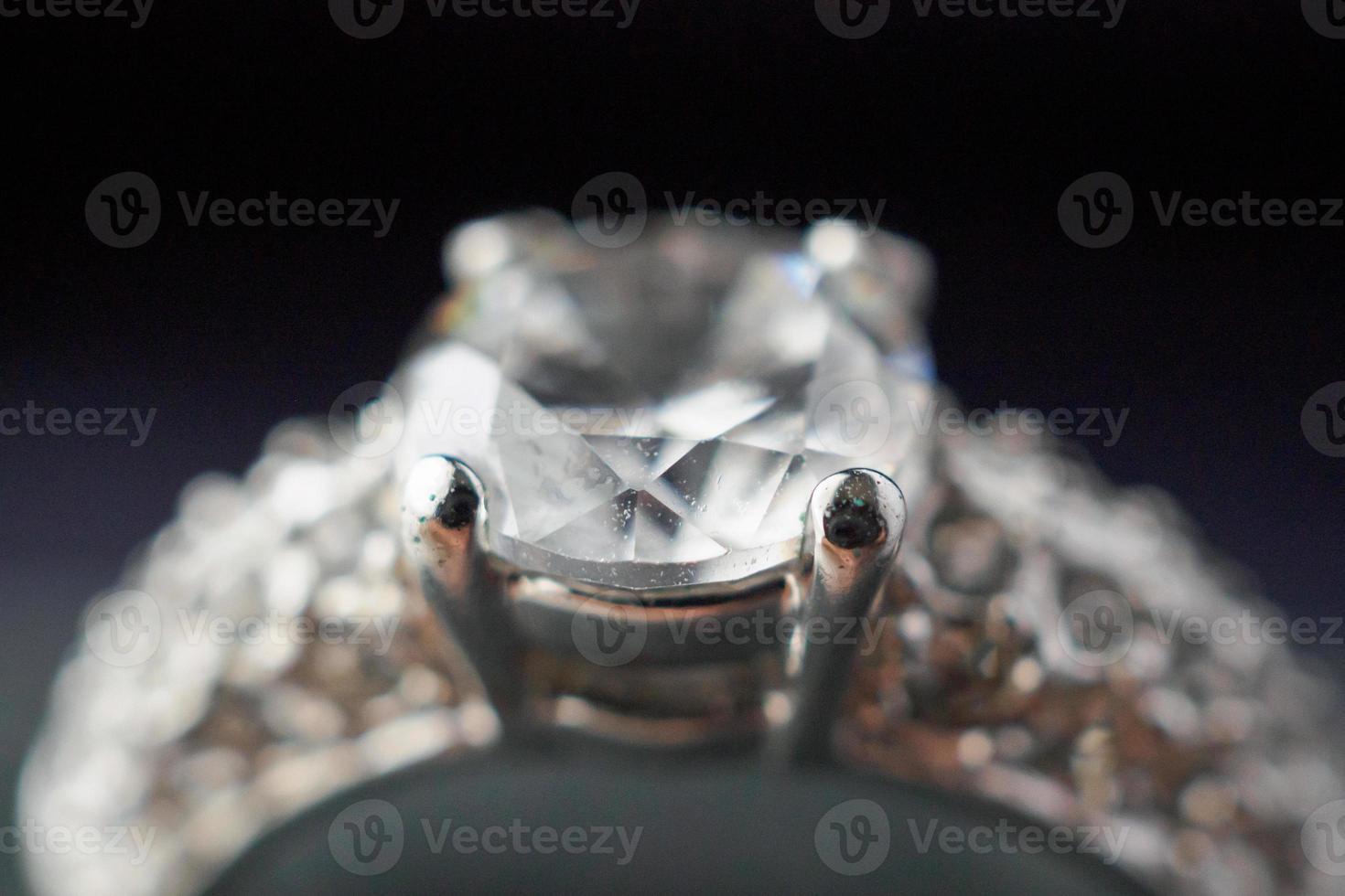 Diamond ring in jewelry gift box close up background photo