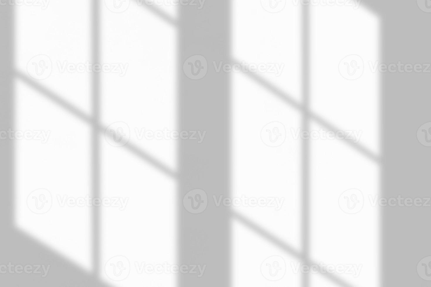 Window shadow drop on white wall background photo