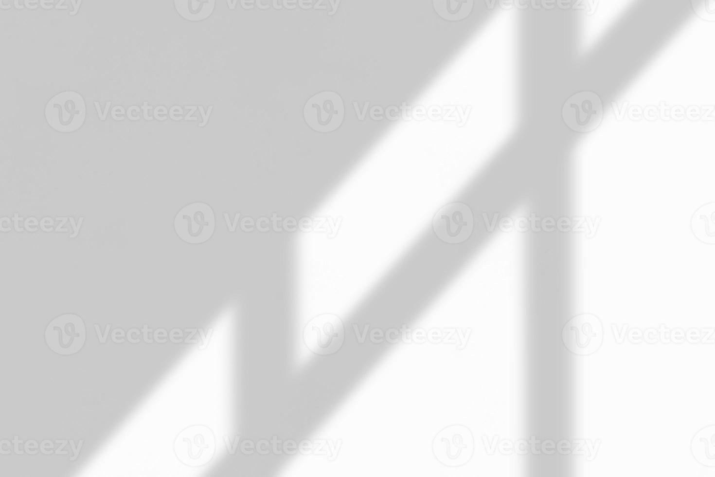 Window shadow drop on white wall background photo