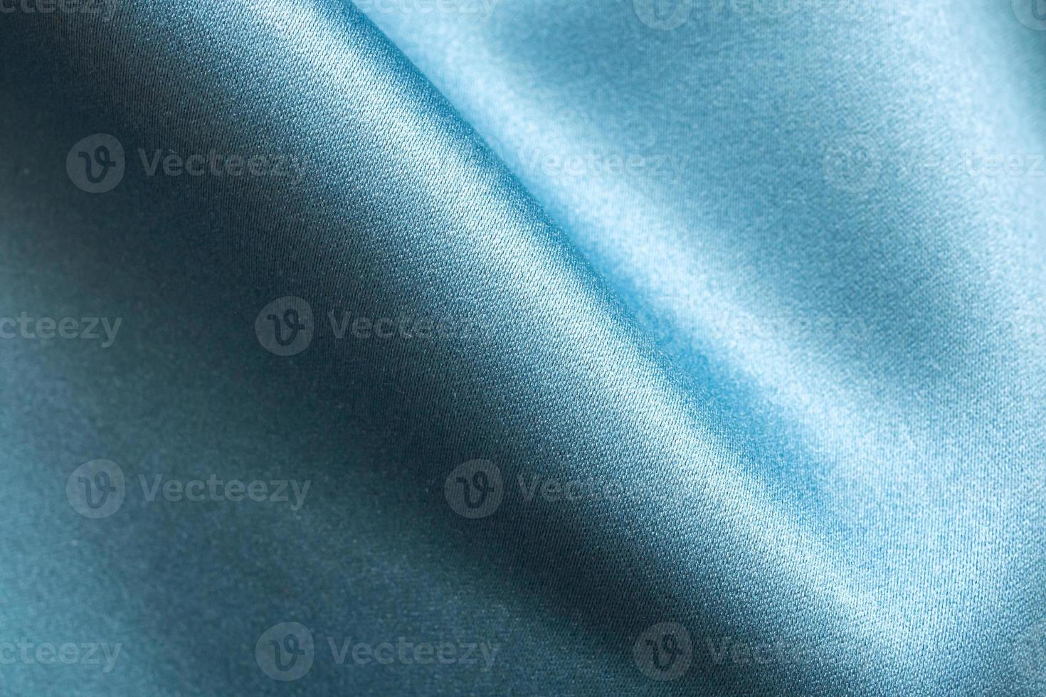 Blue fabric texture background close up photo