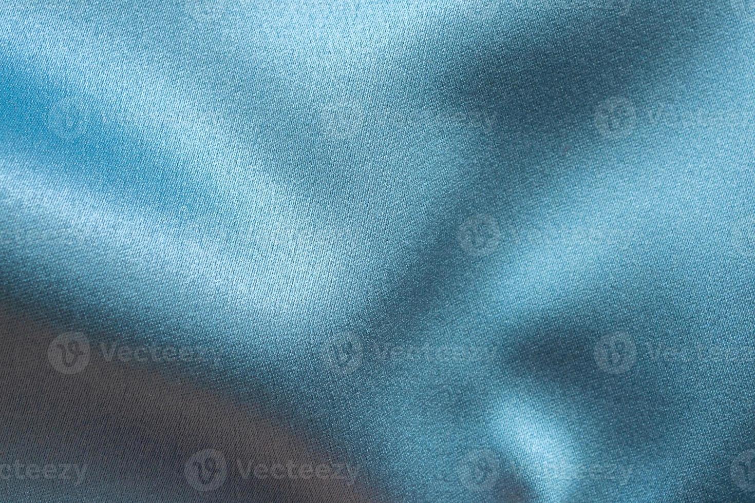 Blue fabric texture background close up photo