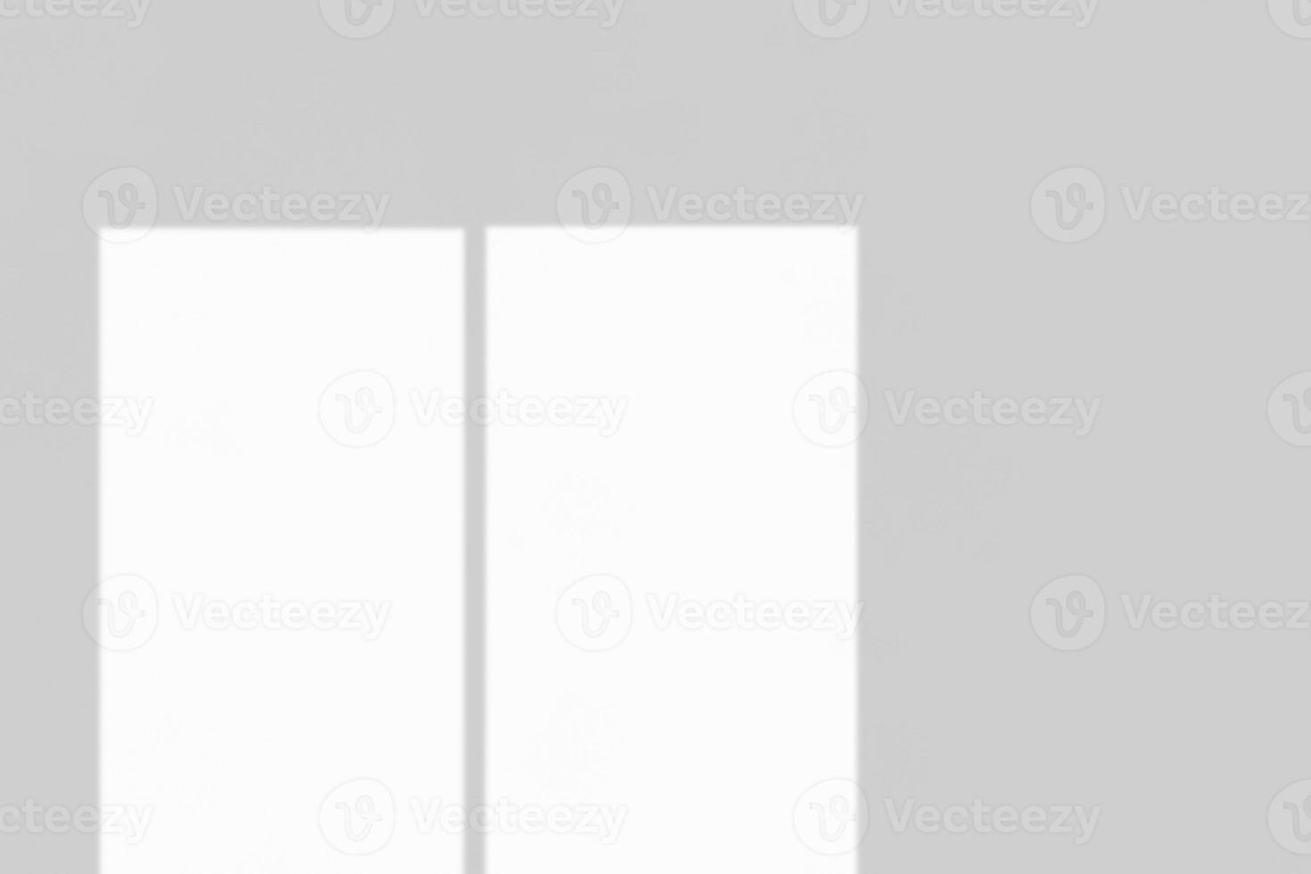 Window shadow drop on white wall background photo