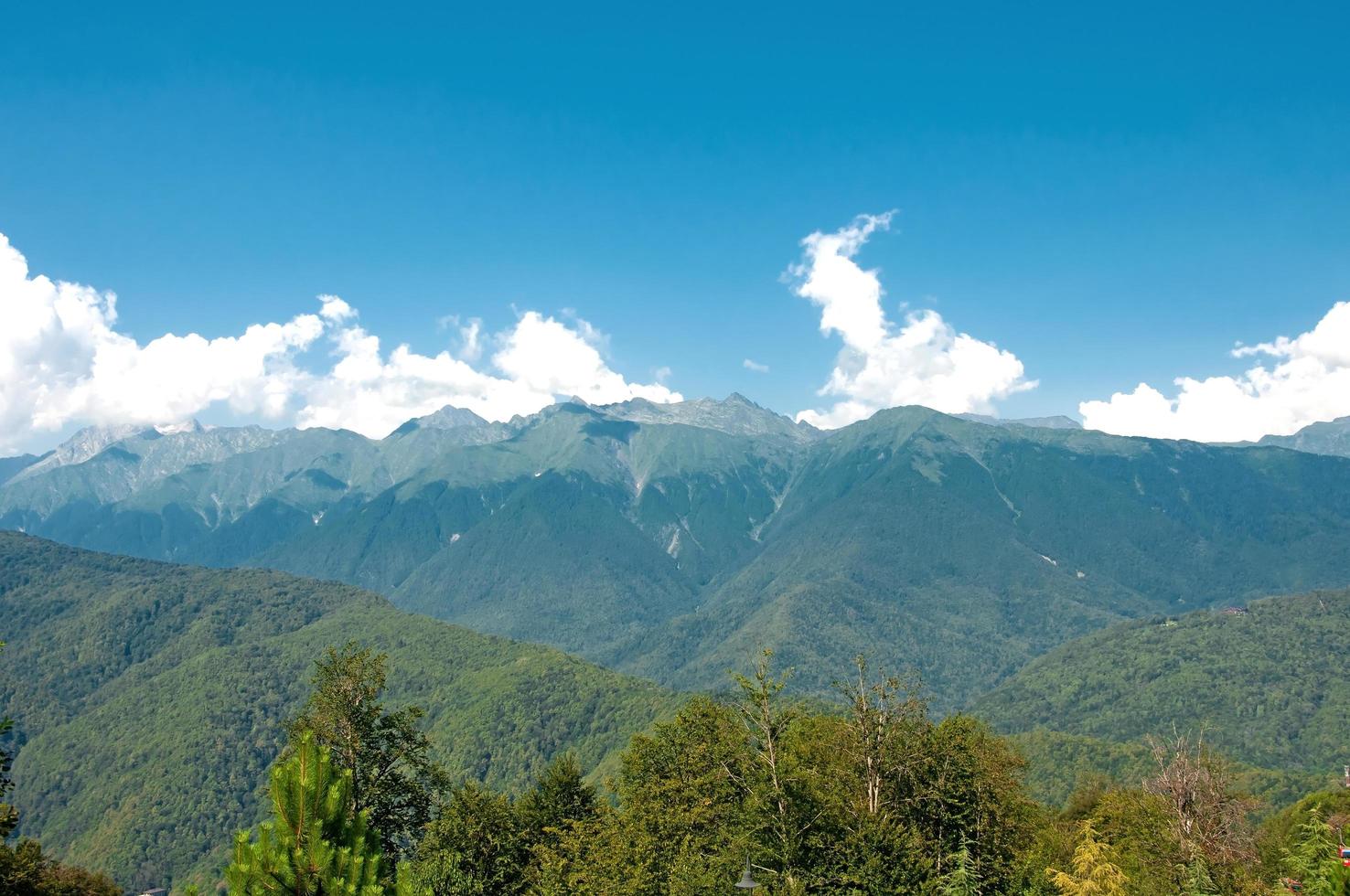 Sochi, Russia - 22 April 2022 Mountain peaks in Krasnaya Polyana photo