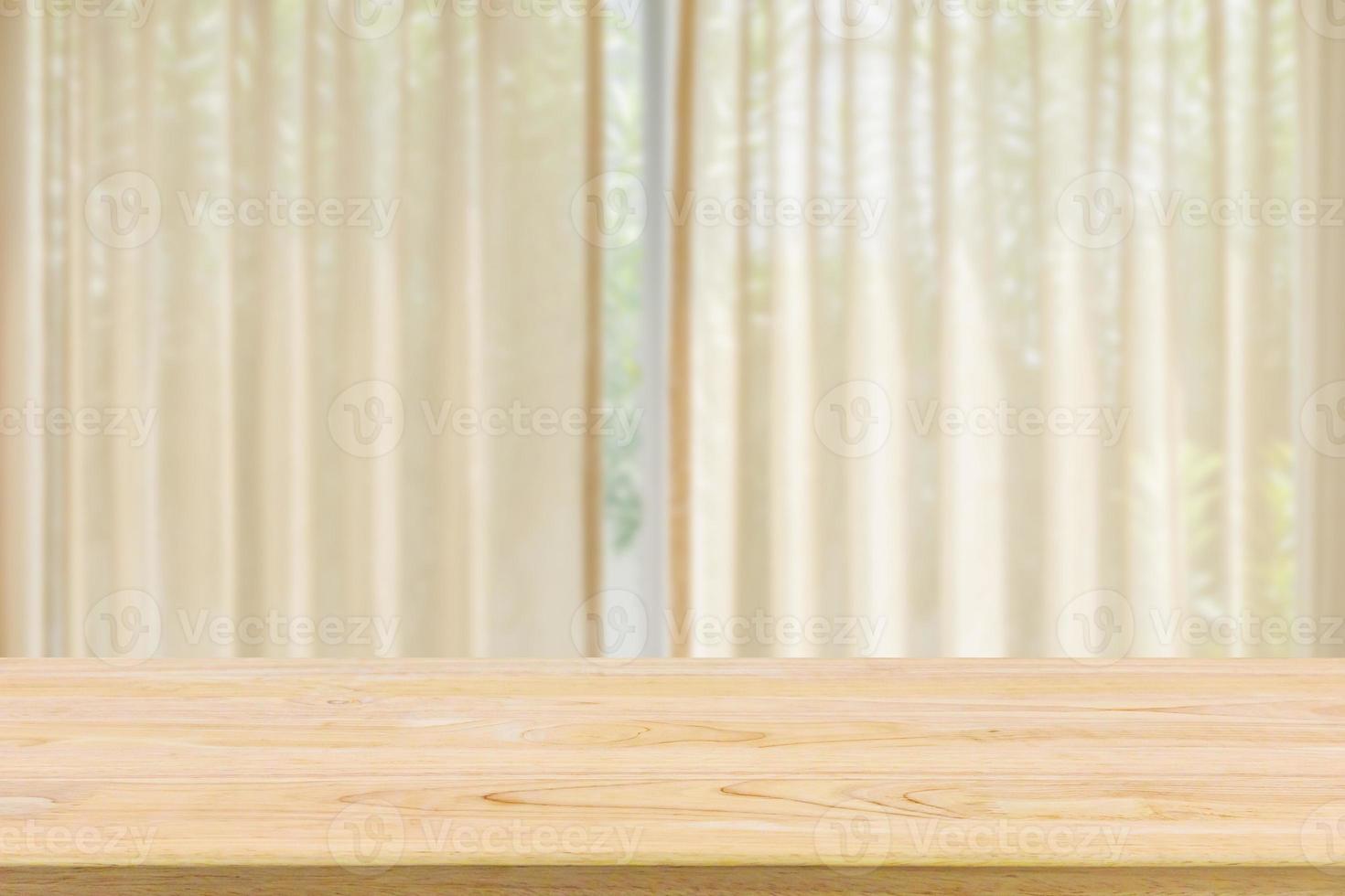 Empty wood table top with window curtain abstract blur background for product display photo