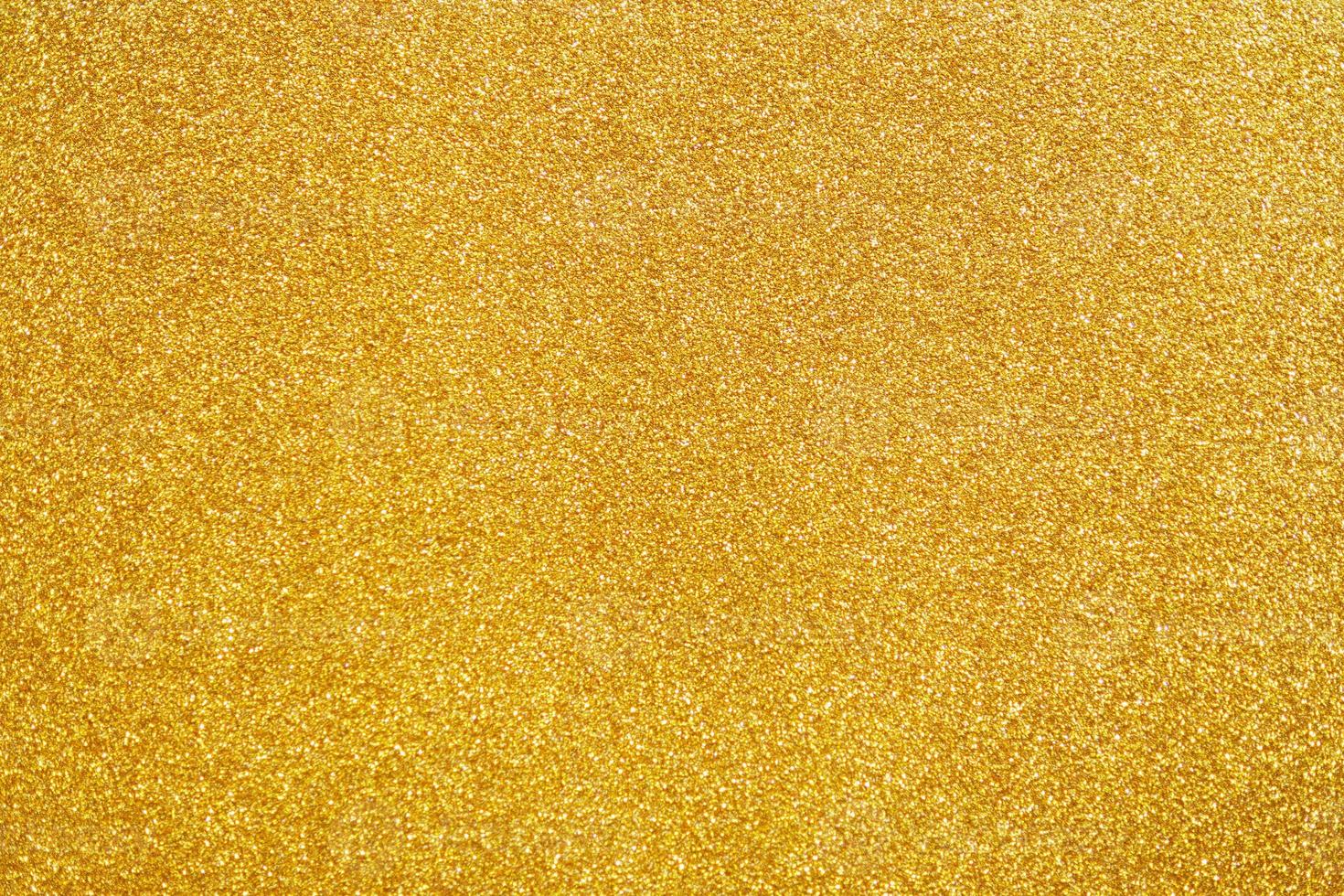 fondo de textura de brillo de brillo de oro abstracto foto