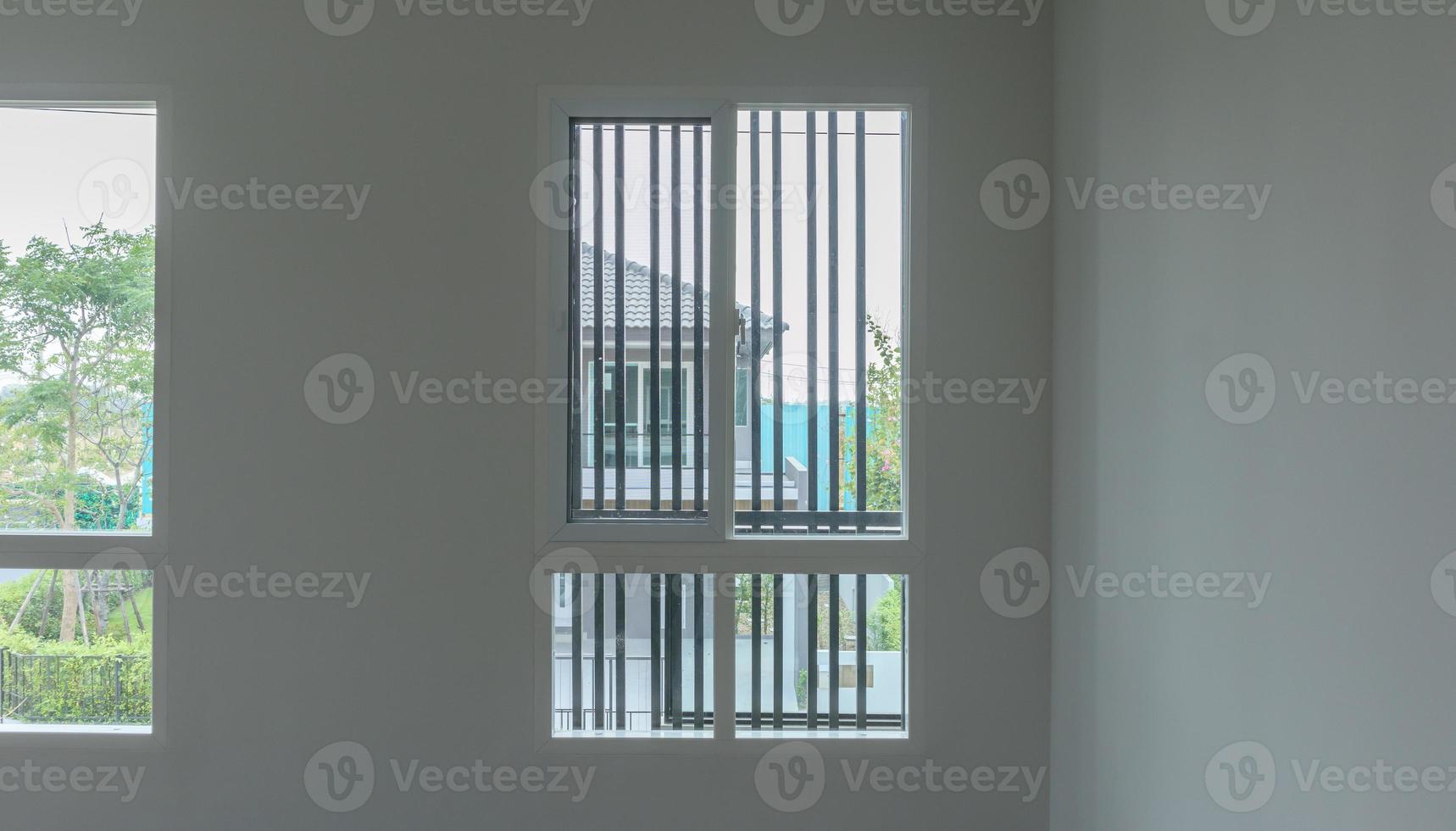 Glass window frame house interior on white wall photo