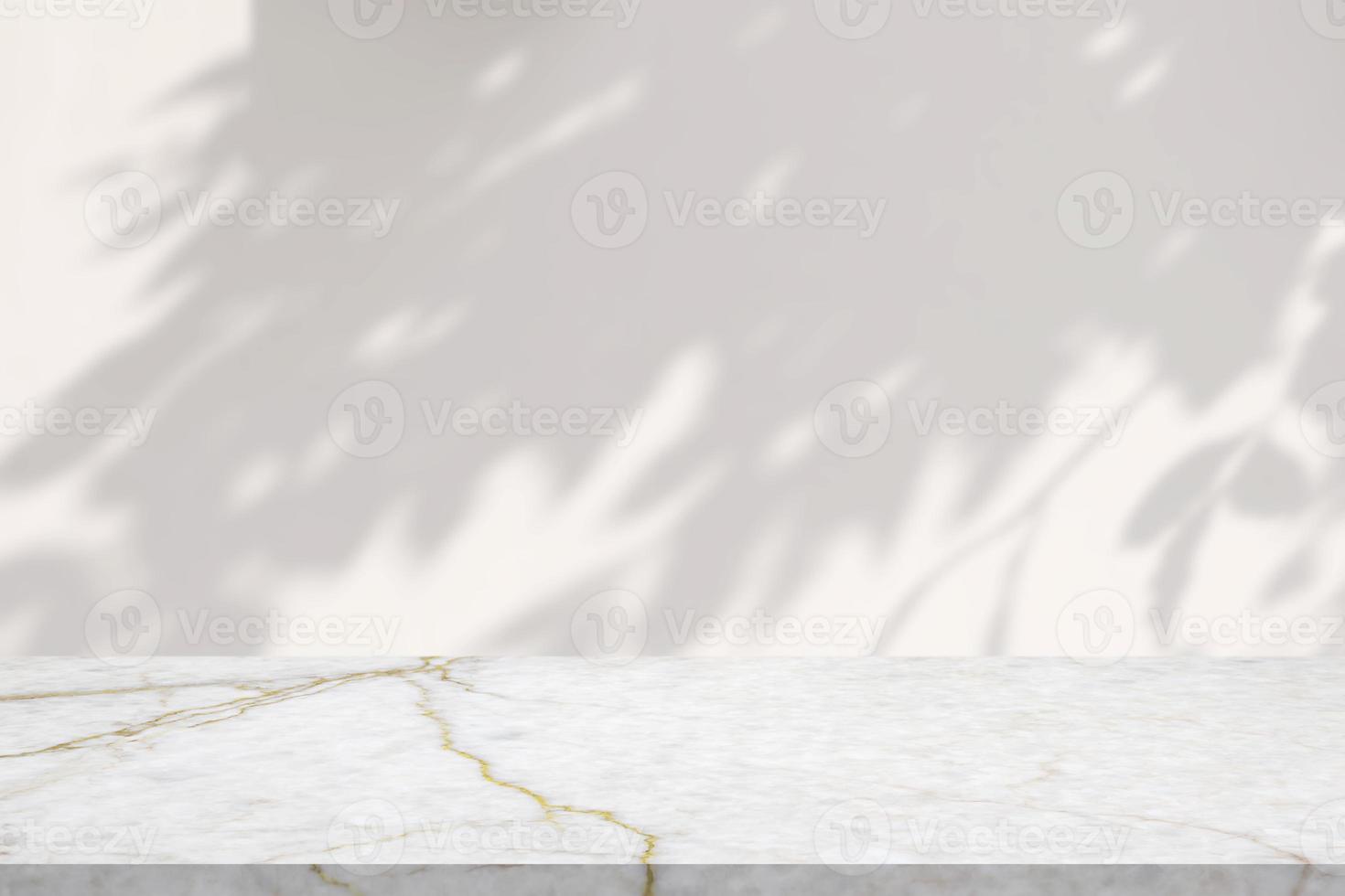 Marble table with tree shadow drop on white wall background for mockup product display photo