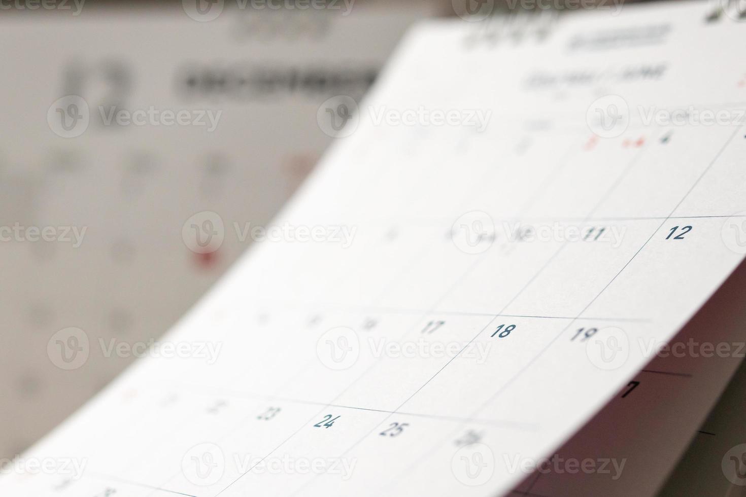 Abstract blur calendar page flipping sheet close up background business schedule planning appointment meeting concept photo