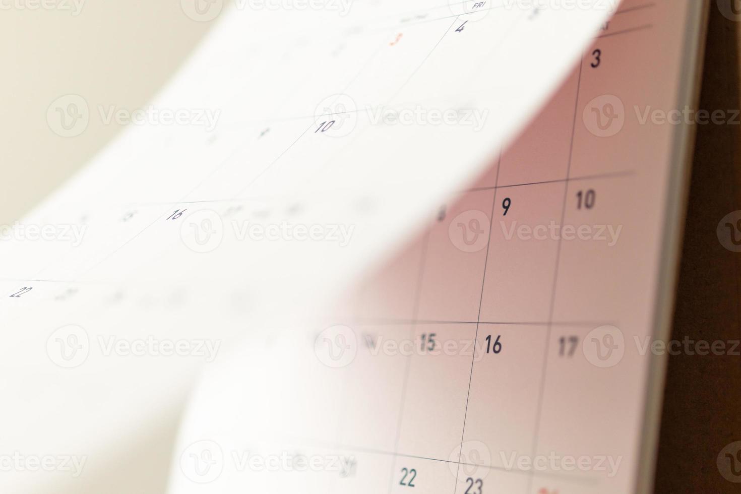 Abstract blur calendar page flipping sheet close up background business schedule planning appointment meeting concept photo