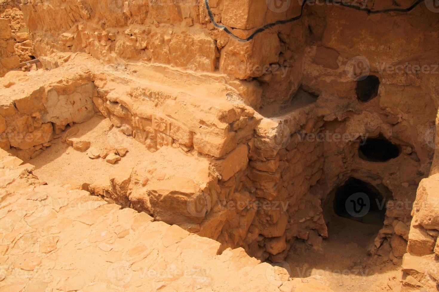 A view of the Hilltop fortress of Massada in Israel photo
