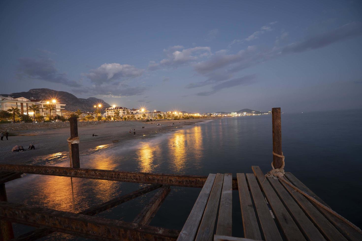 Dusk at  harbour from the end of the pier. Long exposure and calm water. photo