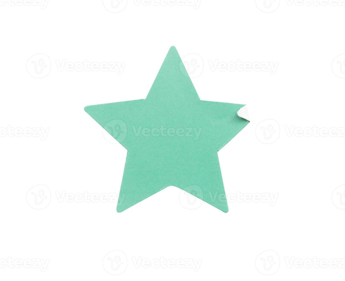Etiqueta adhesiva de papel con forma de estrella azul aislada sobre fondo blanco foto