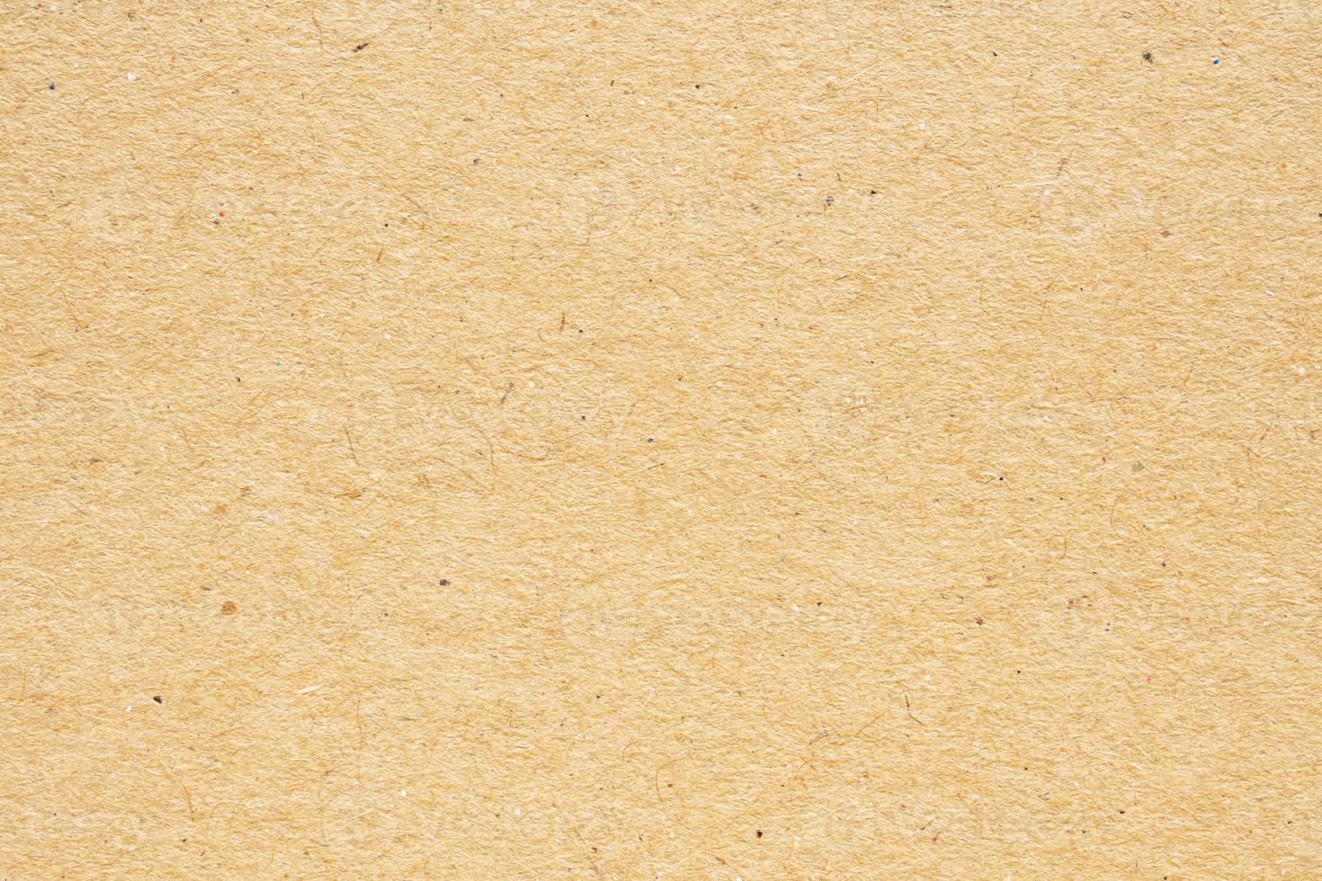 Fondo de textura de papel kraft reciclado marrón foto