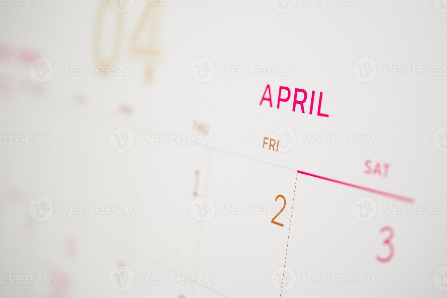 April calendar page with months and dates business planning appointment meeting concept photo