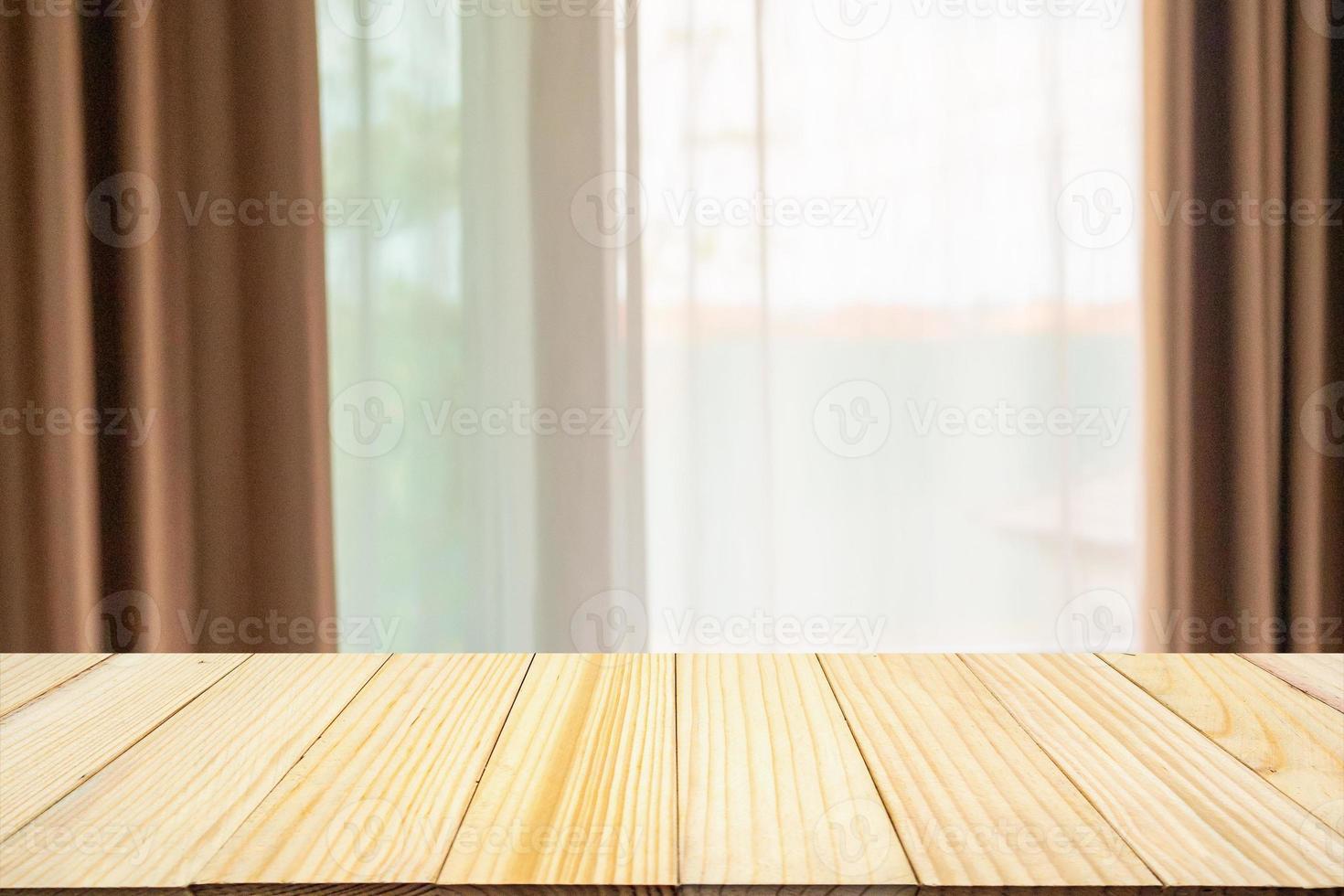 Empty wood table top with window curtain abstract blur background for product display photo