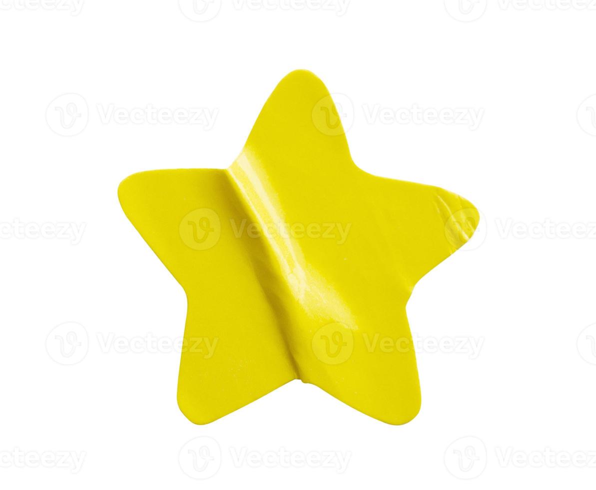 Yellow star shape paper sticker label isolated on white background photo