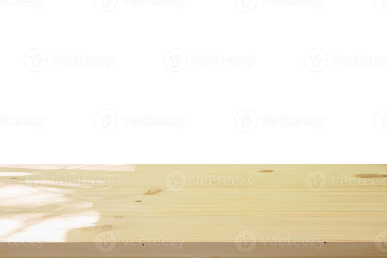 Empty wooden table top isolated on white background for montage product display photo