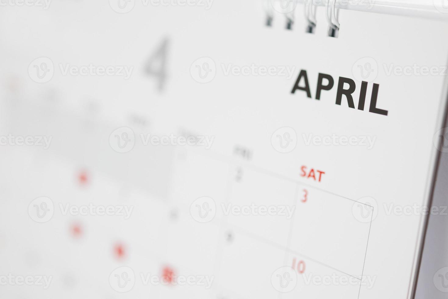 April calendar page with months and dates business planning appointment meeting concept photo